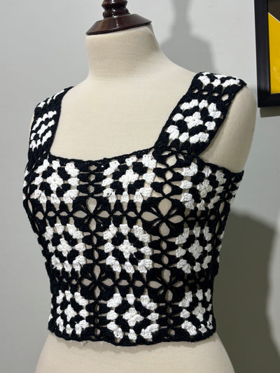 Side detail of black and white floral openwork crop top - alternate view