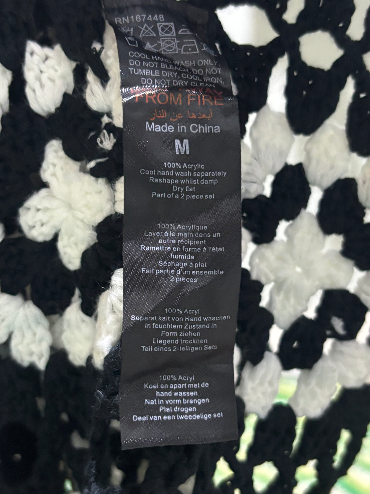 F&F label showing size M and 100% Acrylic