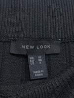 New Look skirt label showing UK 10 EU 38 US 6