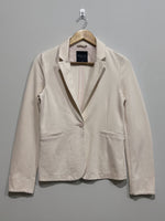 Cream fitted long-sleeve blazer front view