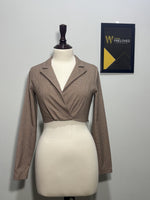 Brown and black checked lapel wrap-style crop top front view