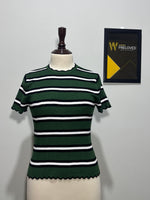 Dark green black and white striped scallop-trim top on mannequin