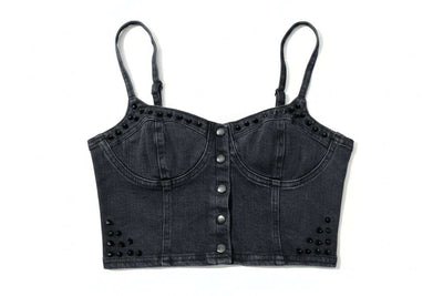 Black denim crop top with button details on a green grass background - alternate view