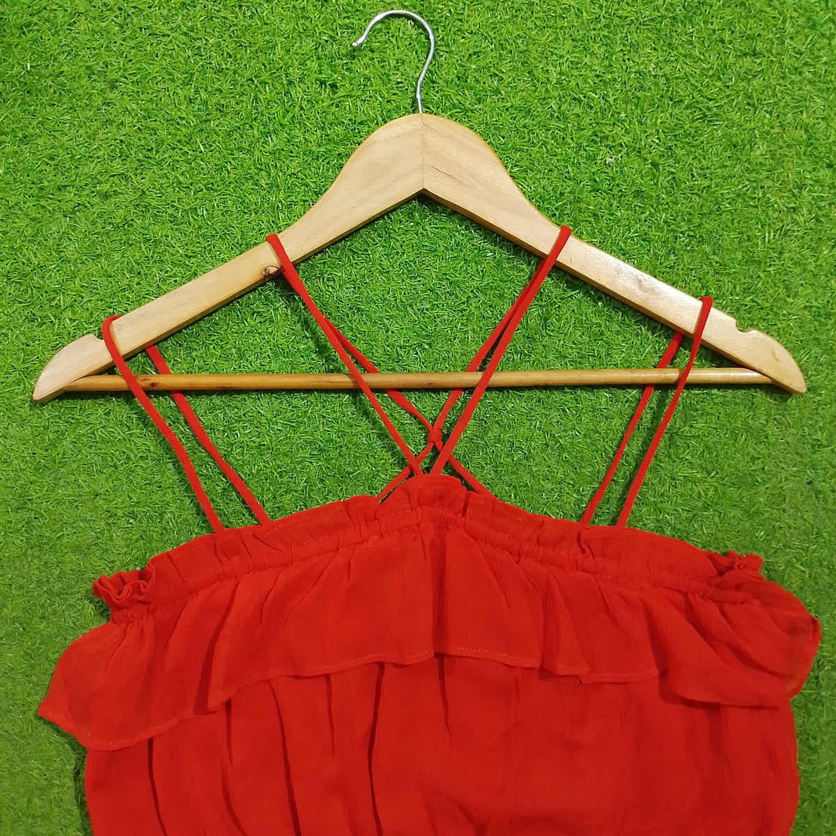 Red off-shoulder ruffle criss-cross strap peplum top - strap detail