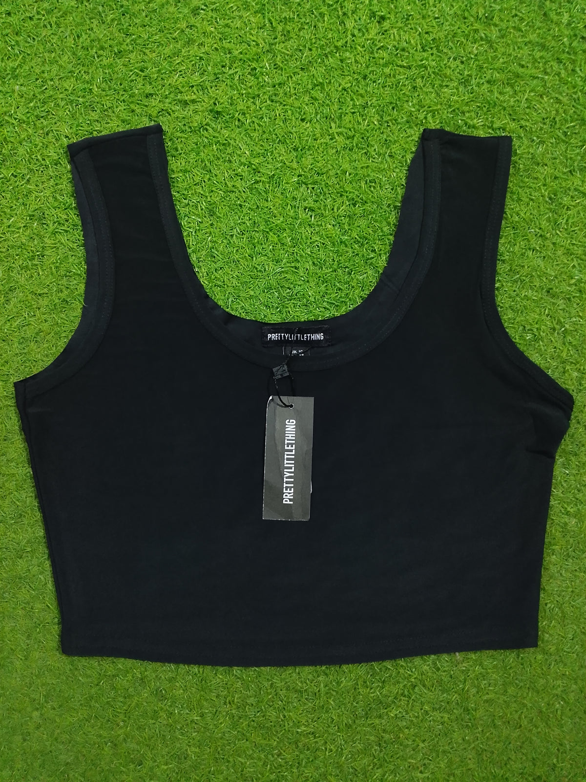 Black sleeveless scoop neck crop top - label detail PrettyLittleThing UK 10
