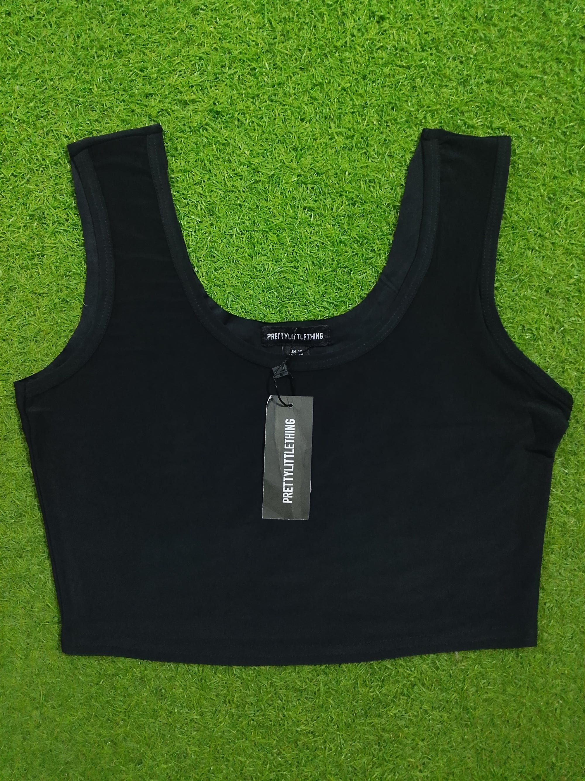 Black sleeveless scoop neck crop top - label detail PrettyLittleThing UK 10