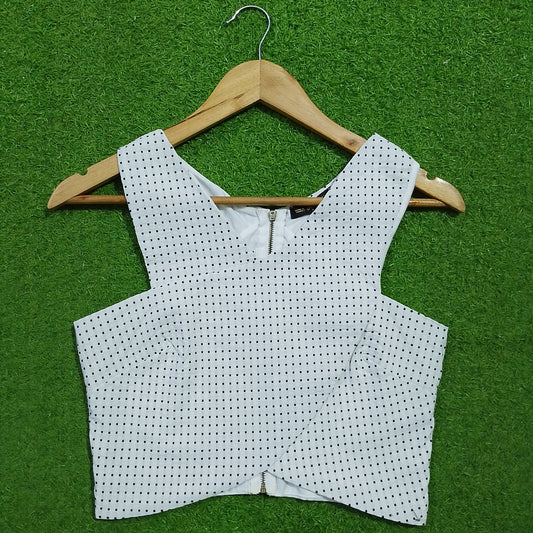 White polka dot V-neck zip front corset crop top - front view