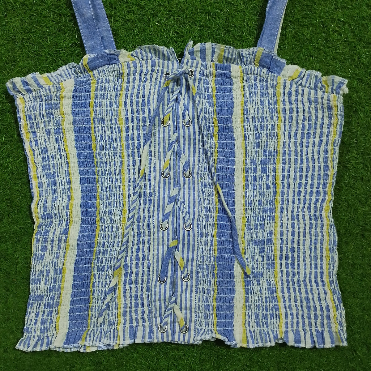 Blue striped smocked lace-up crop top - front flat lay detail