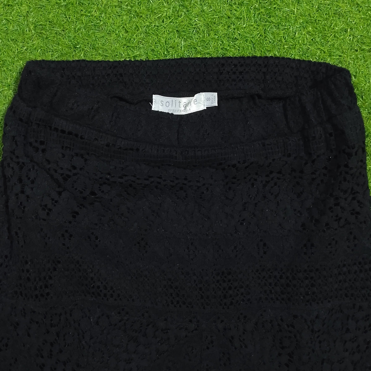 Black lace crochet maxi skirt - waistband and brand label detail