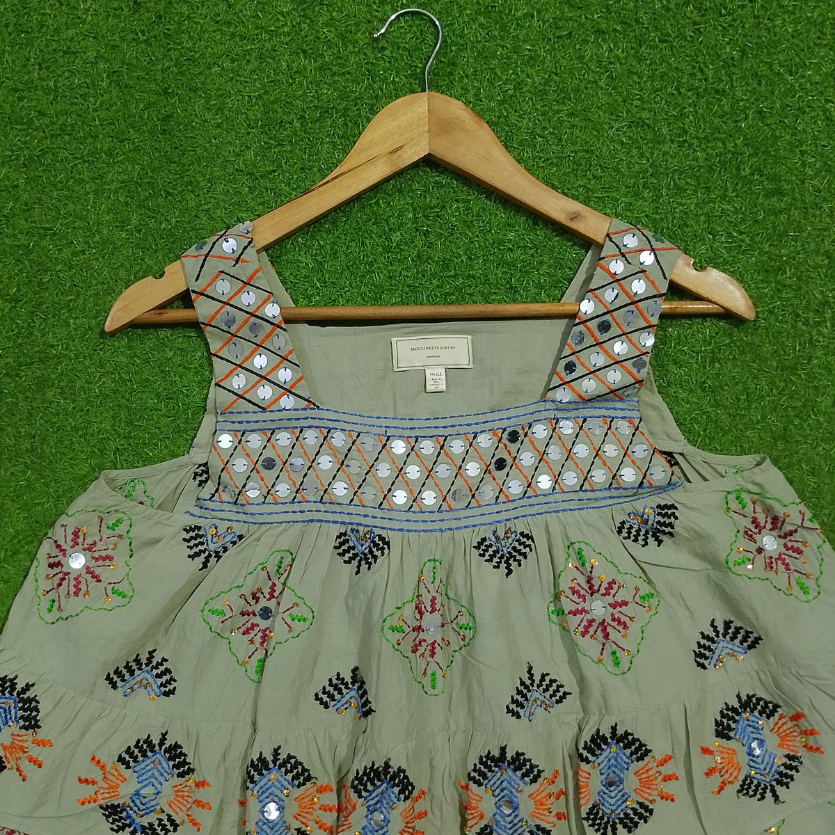 Sage green embroidered mirror work tiered crop top - bust and strap detail