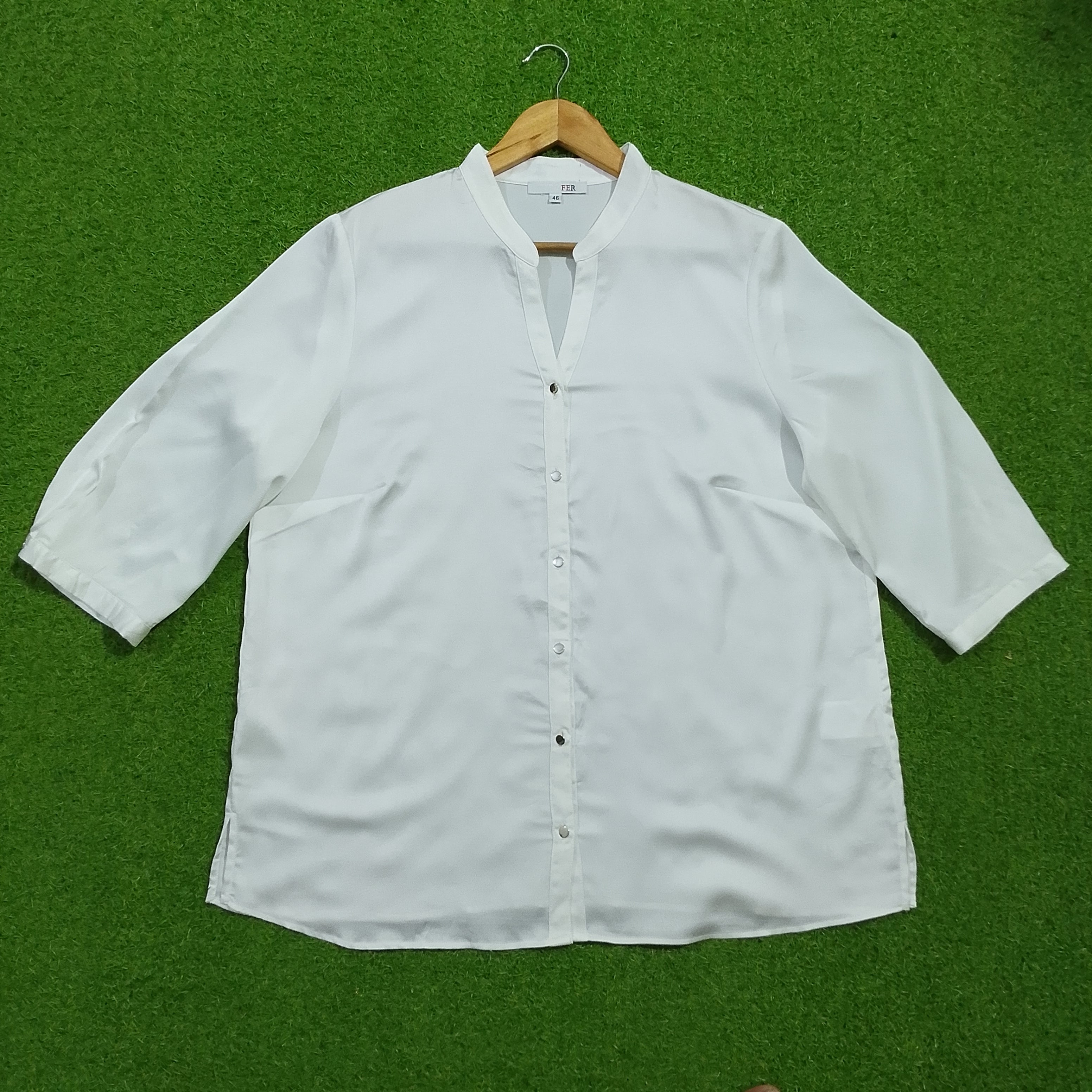 White 3/4 sleeve mandarin collar snap button-front shirt - front view
