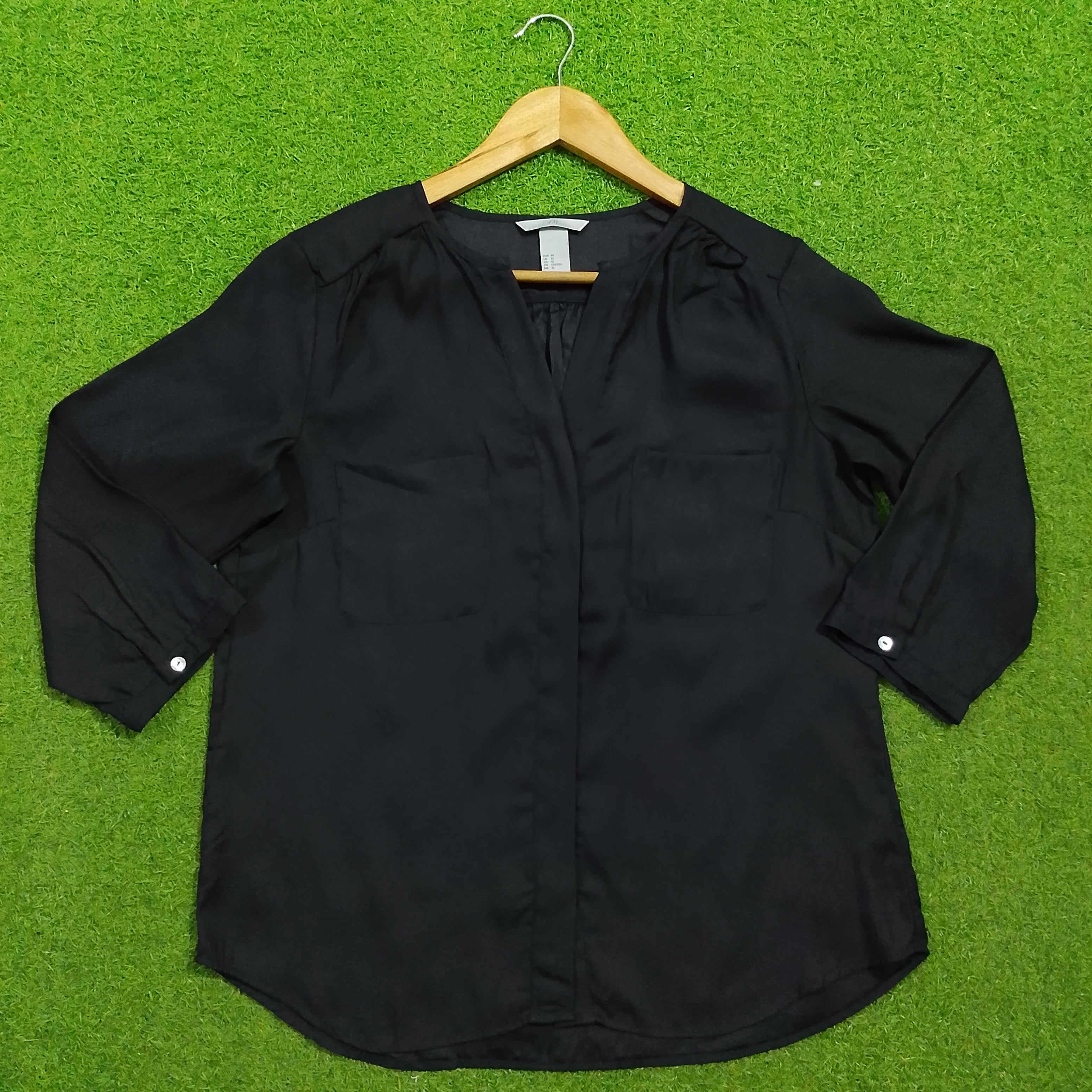 Black 3/4 sleeve V-neck gathered shoulder silk blouse - front view