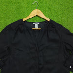 Black 3/4 sleeve V-neck gathered shoulder silk blouse - neckline detail