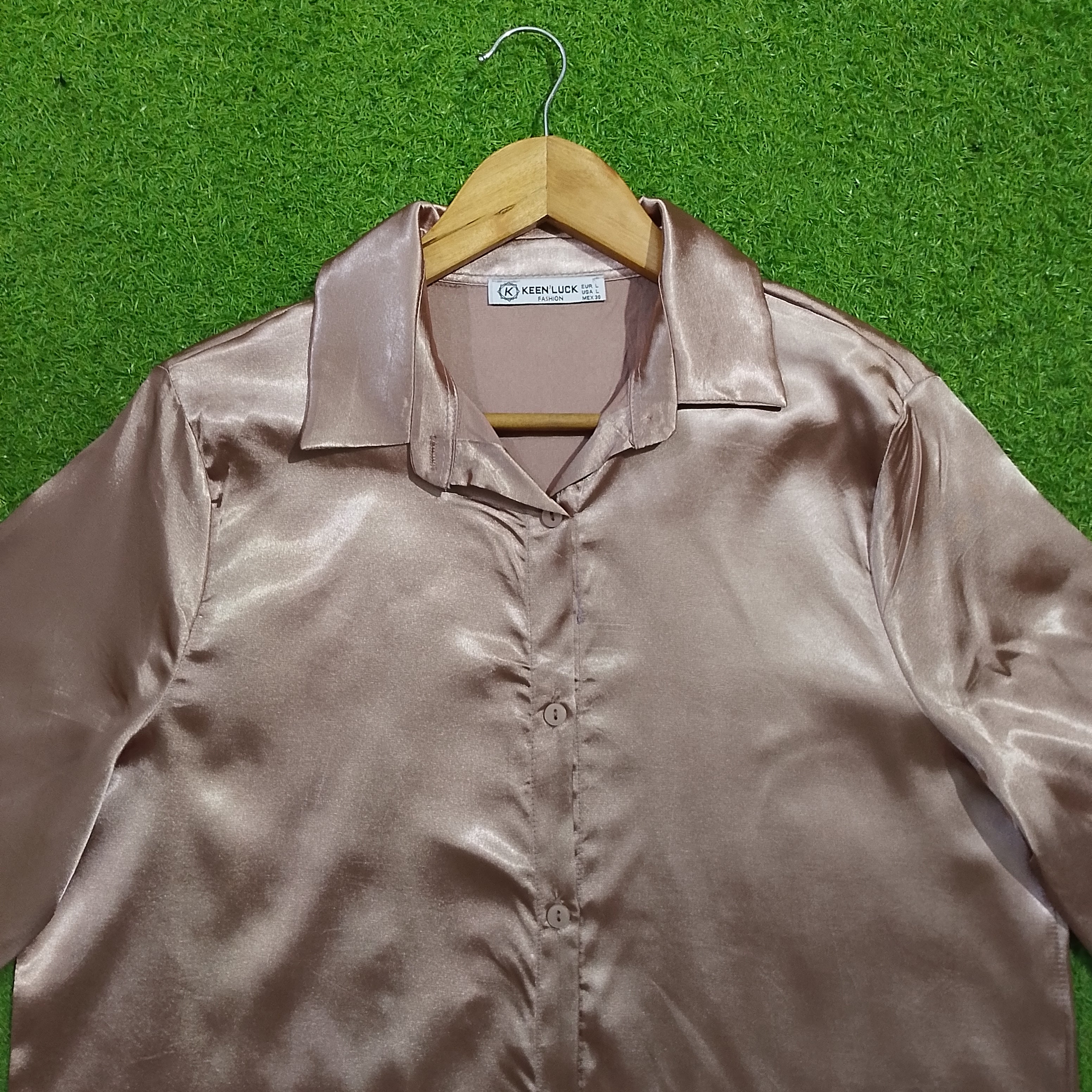 Champagne satin long sleeve shirt front close-up