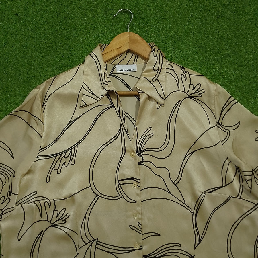 Beige black floral outline print long sleeve shirt collar close-up