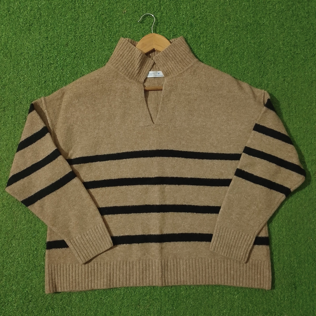 Camel and black striped drop shoulder knit sweater - front view