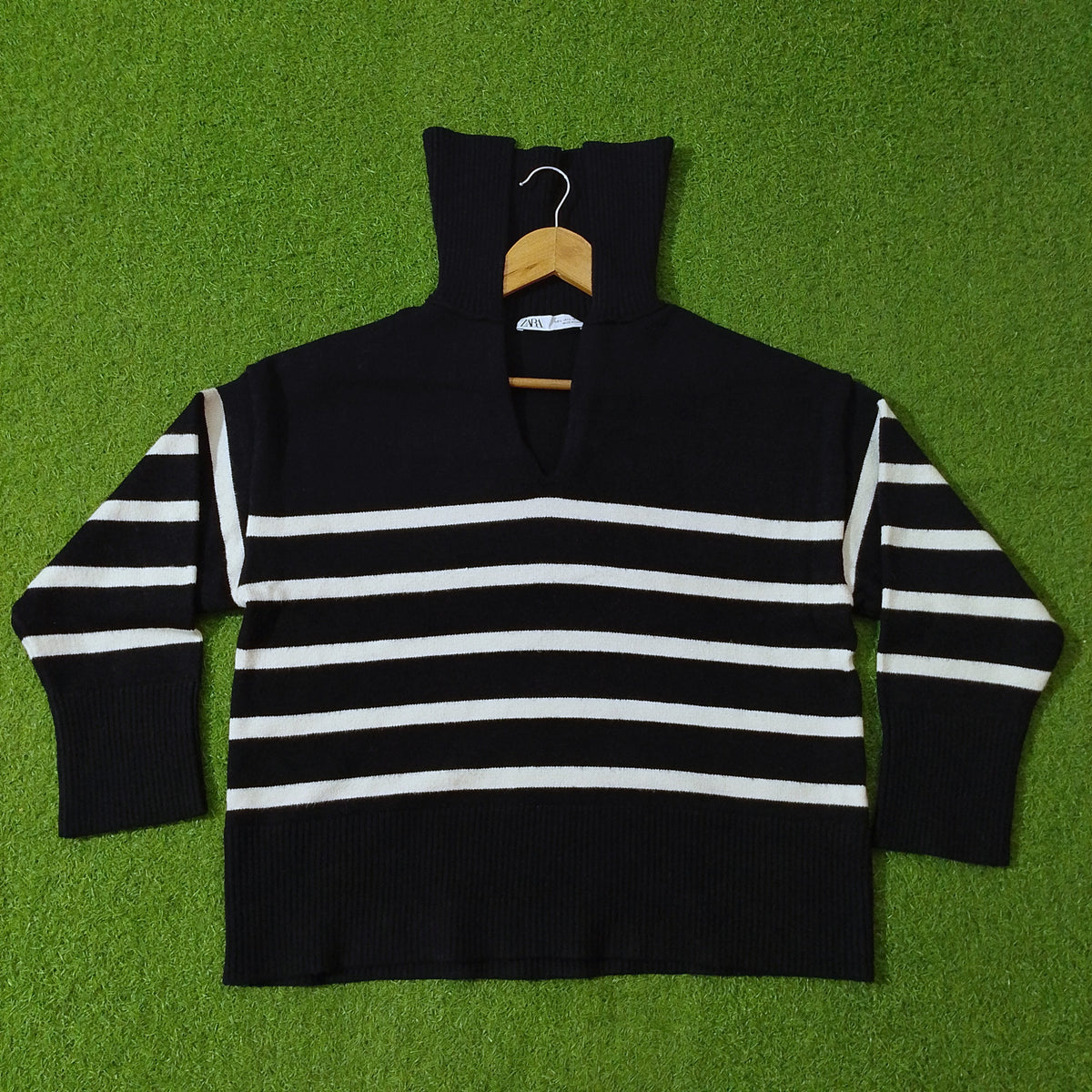 Black and white striped drop shoulder ribbed collar knit blouse - full view