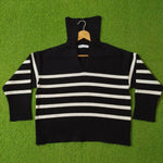 Black and white striped drop shoulder high ribbed collar open V-neck knit blouse - front view