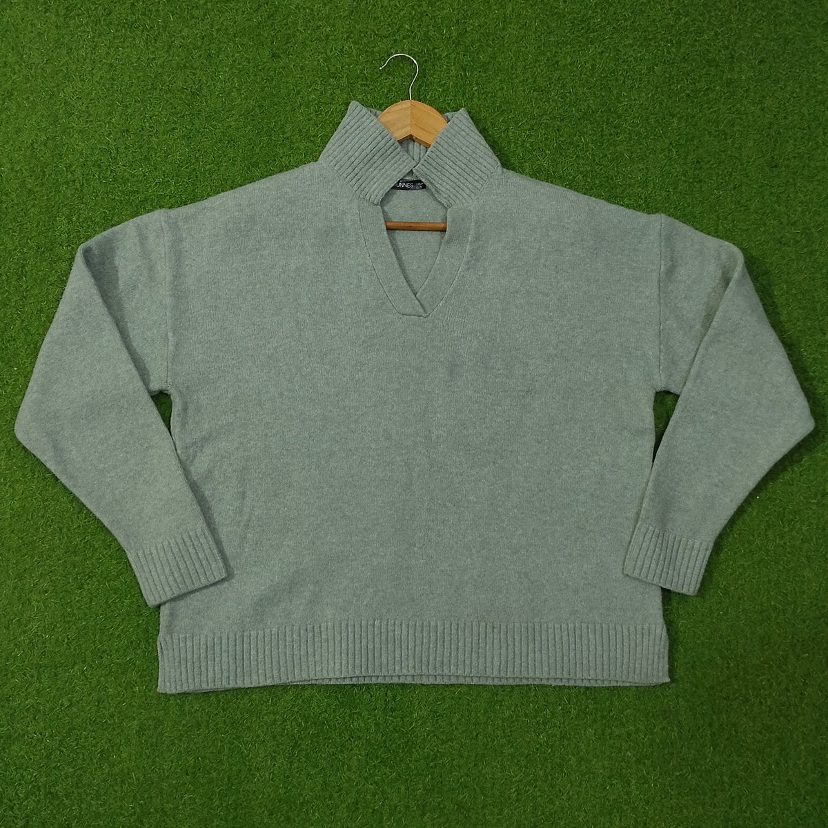 Sage green drop shoulder ribbed collar open V-neck knit blouse - full view