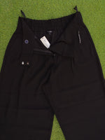 River Island black wide leg trousers waist detail with tag