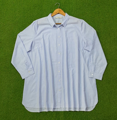 Blue pinstripe oversized button-down cotton shirt by CKH - full front view on hanger