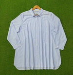 Blue pinstripe oversized button-down cotton shirt by CKH - full front view on hanger