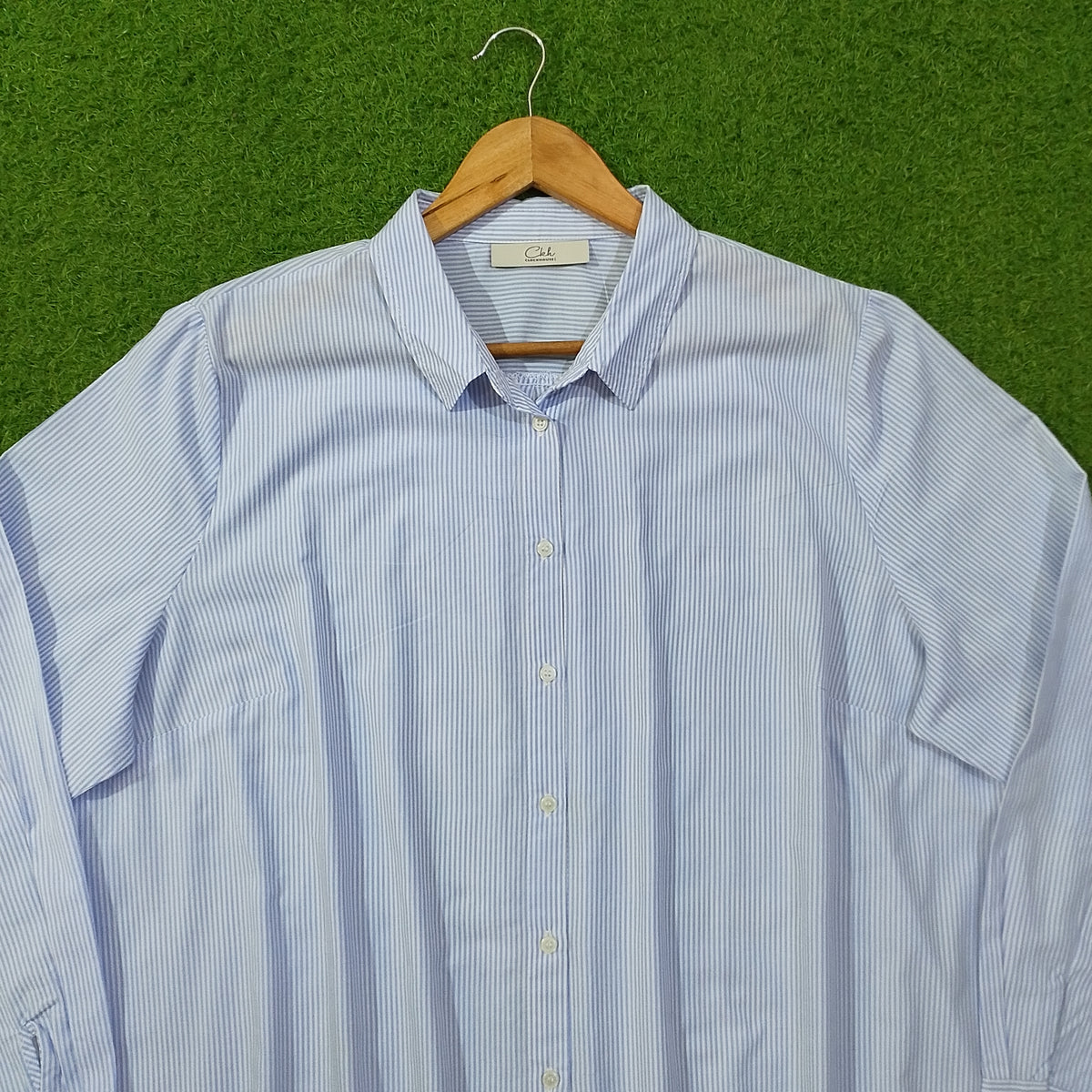 Blue pinstripe oversized button-down cotton shirt by CKH - collar and label close up