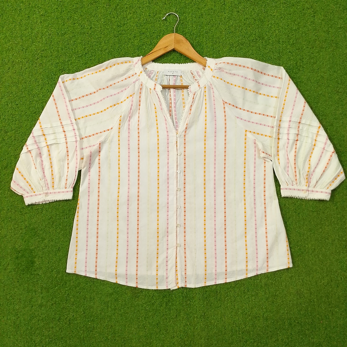 White diamond stripe puff sleeve cotton top by Papaya - full front view on hanger