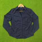 Navy blue polka dot cotton shirt by Mango - front view on hanger