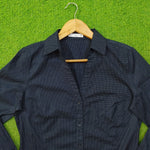 Navy blue polka dot cotton shirt by Mango - collar and label close up