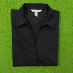 Black button-down cotton shirt by H&M - folded view
