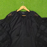 Black crochet lace puff sleeve cotton top by Ibana - neckline and label close up