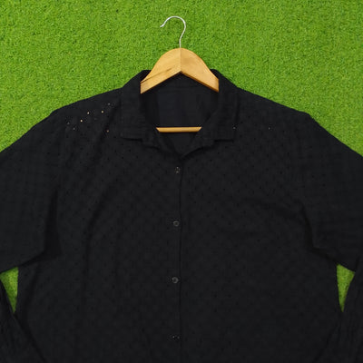 Black eyelet cotton oversized shirt - collar and upper body close up - alternate view
