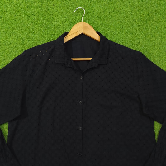 Black eyelet cotton oversized shirt - collar and upper body close up - alternate view