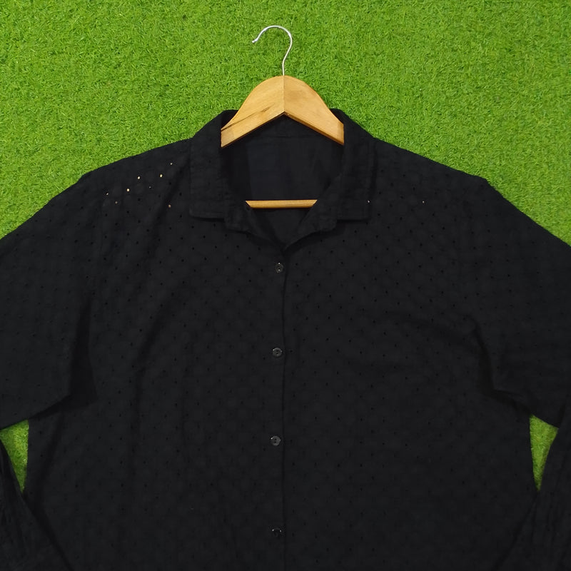 Black eyelet cotton oversized shirt - collar and upper body close up