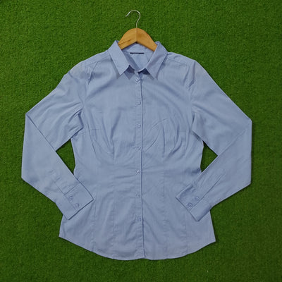 Light blue button-down cotton shirt - front view on hanger