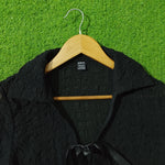 Black chiffon crush crop top Shein label close-up