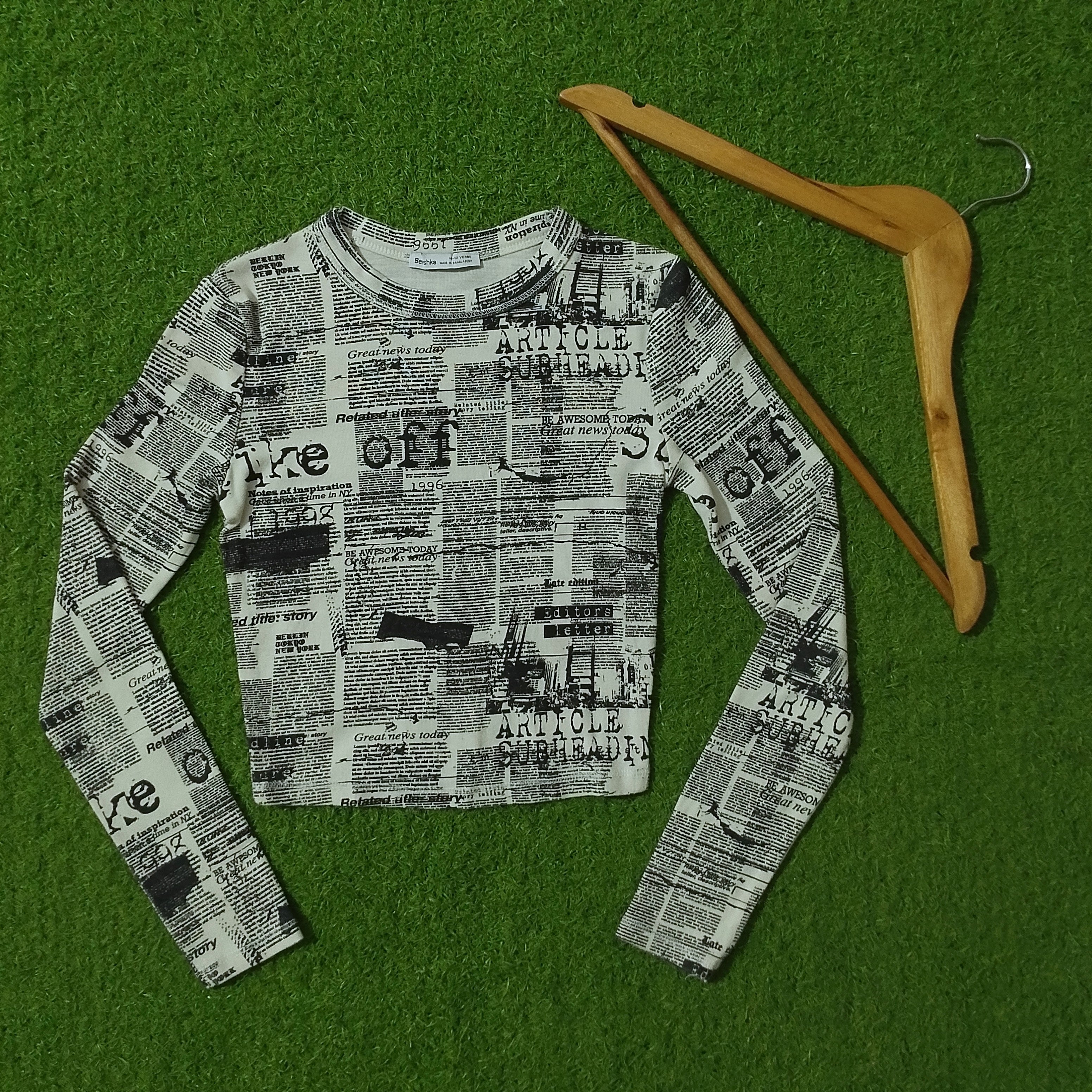 Newspaper print long sleeve crop top full view