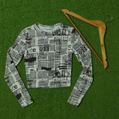 Newspaper print long sleeve crop top full view