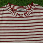 Zara Trafaluc label close-up on striped crop top