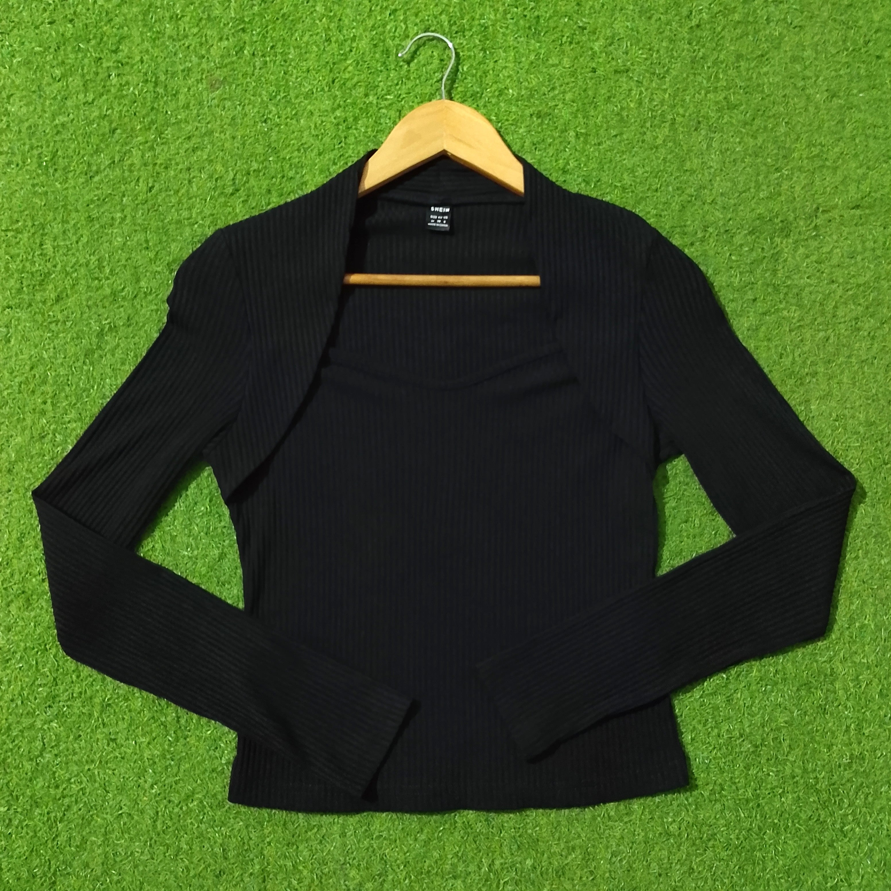 Black ribbed knit open front long sleeve shrug top full view