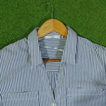 Blue and white striped shirt collar and label
