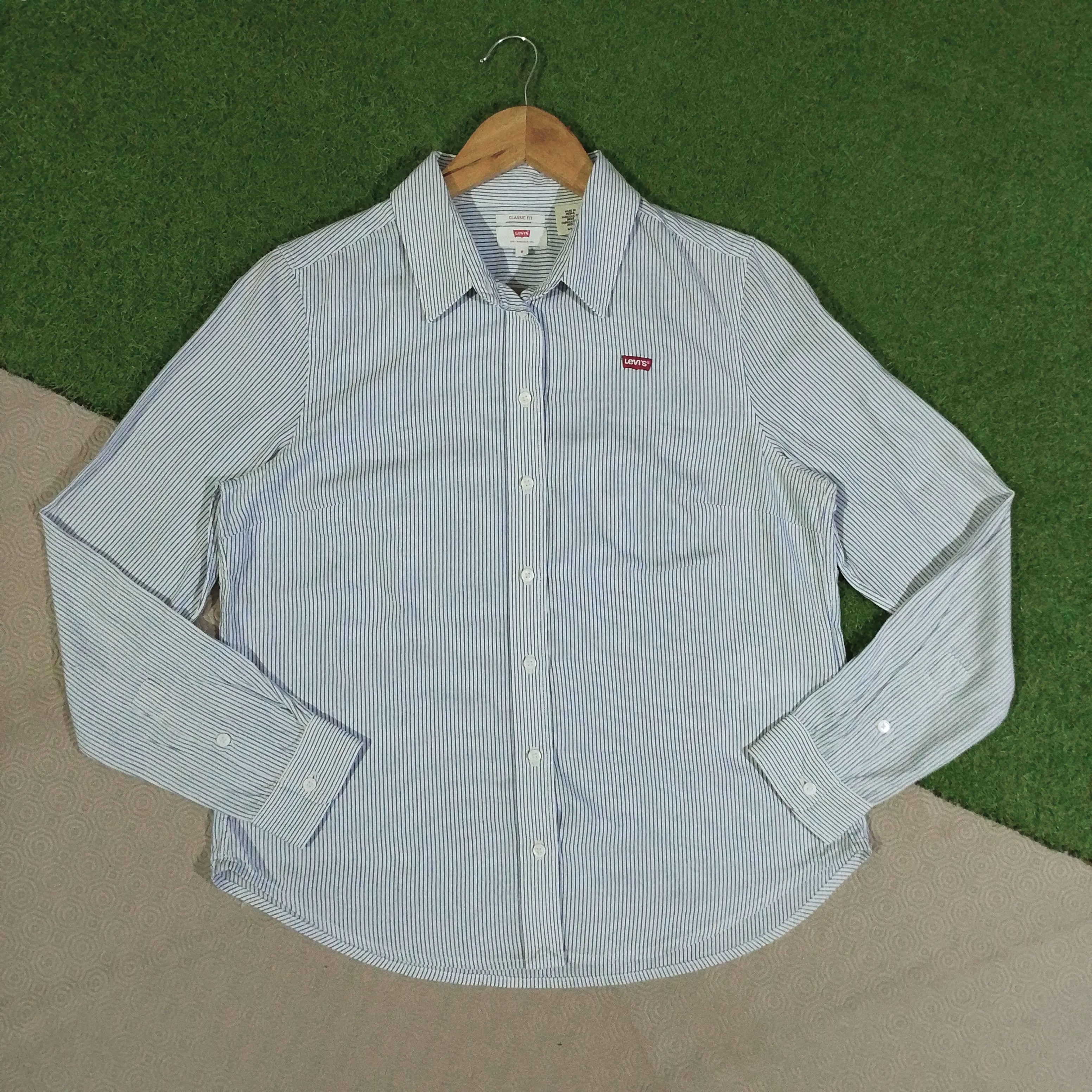 Light blue and white striped Levi's long sleeve shirt