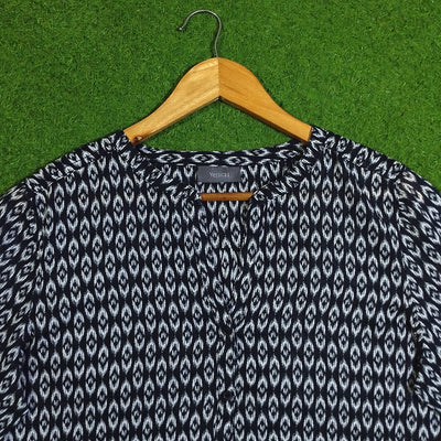 Black and white patterned shirt detail - alternate view