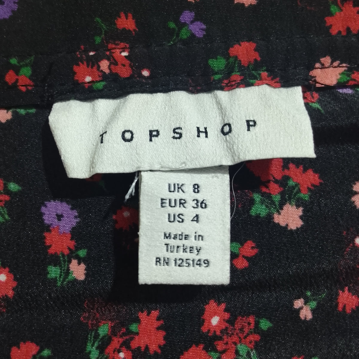 Black Ditsy Floral Smocked Puff Sleeve Tie Cuff Crop Top