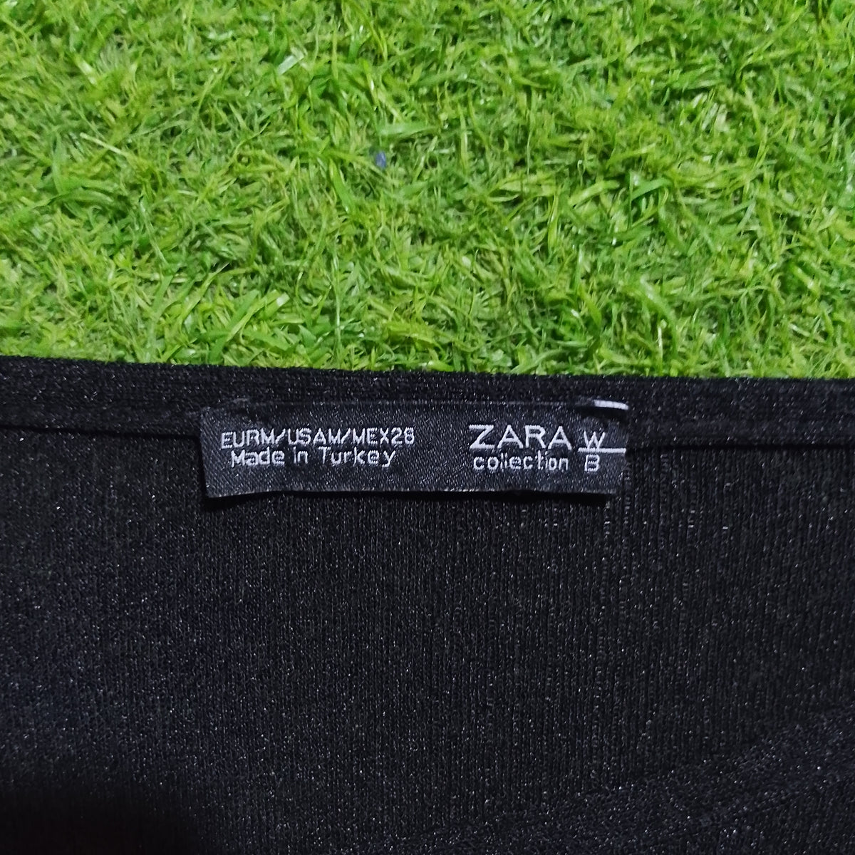 Black Zara crop top brand label