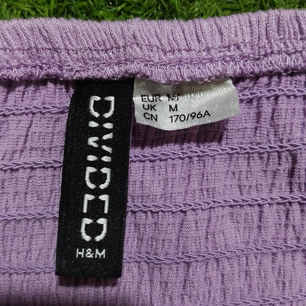 Lilac H&M crop top brand and size label