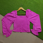 Fuchsia L Sisters puff sleeve and ruffled cuff detail