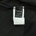 Black Shein crop top brand and size label