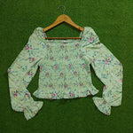 Sage green floral smocked puff sleeve crop top front view